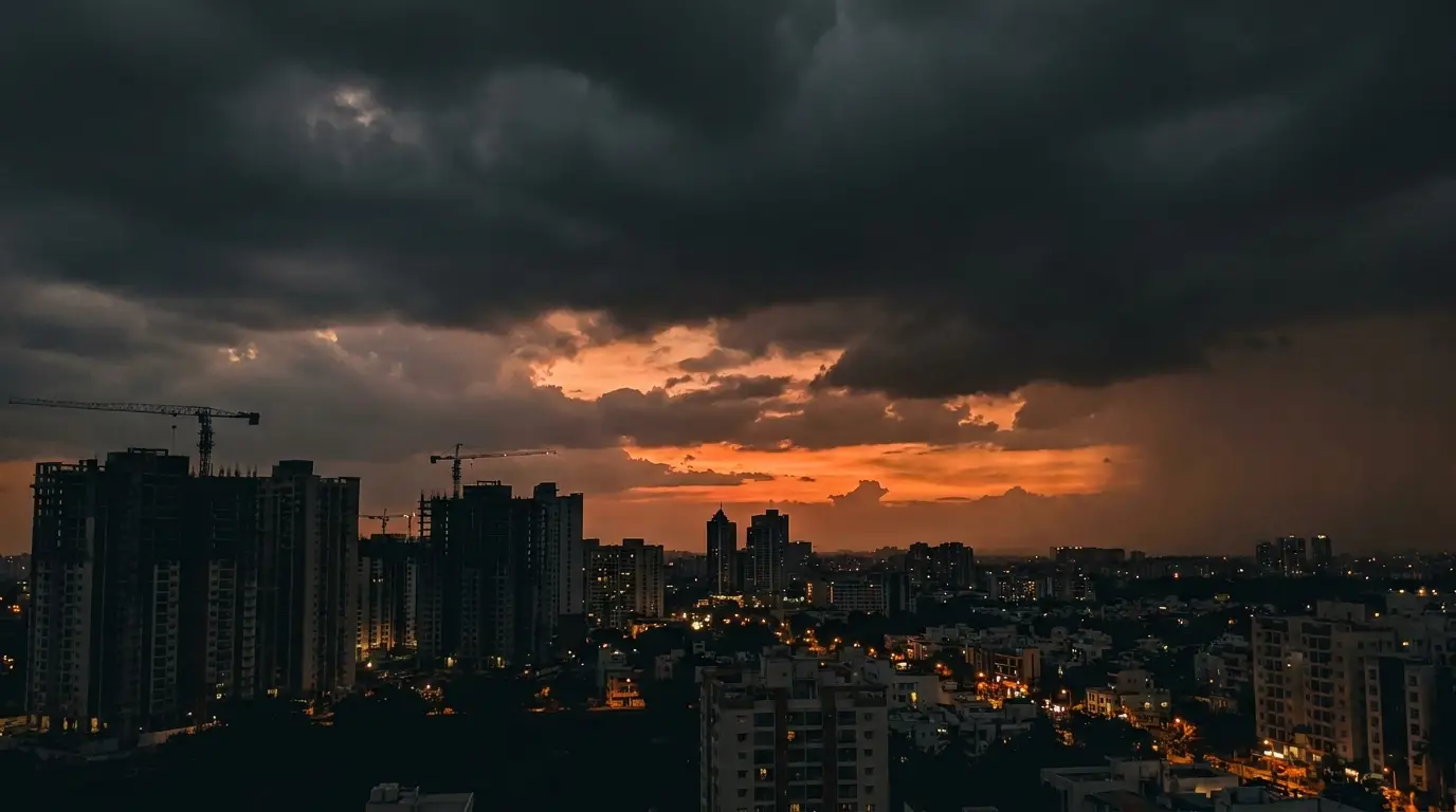 SEO agency in Bangalore — Bengaluru skyline at dusk with ember-orange sunset breaking through storm clouds